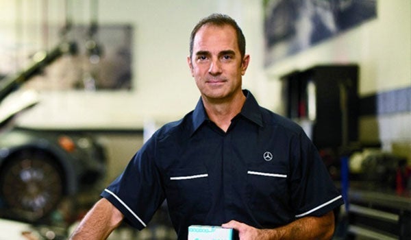 MB technician holding StarParts box